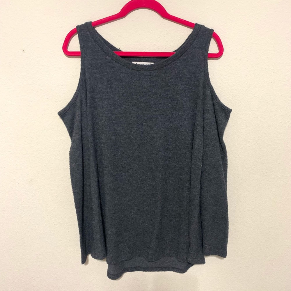 Grey sweater with shoulders cut out.